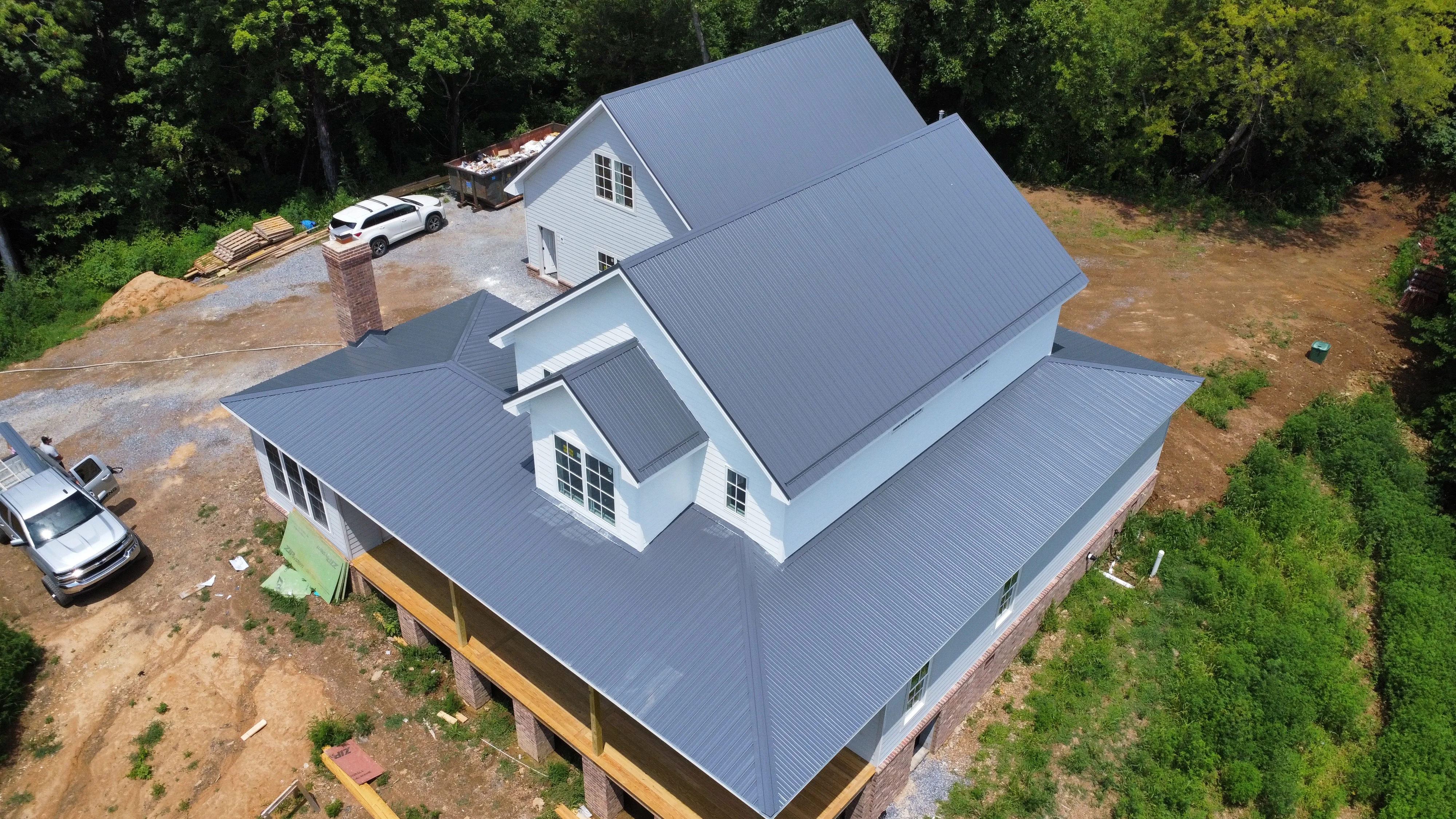 New construction home with a standing-seam metal roof - roofing in Bristol, TN