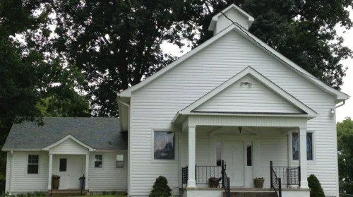 White colored house - roofing in Bristol, TN