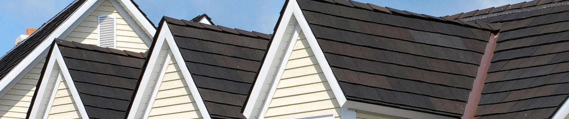 Steep asphalt shingle roofs on a home in Bristol, TN